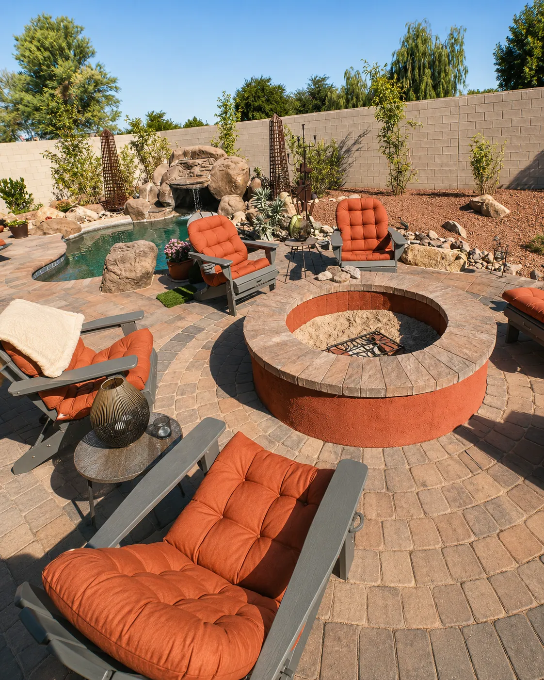 Backyard seating area with a circular fire feature