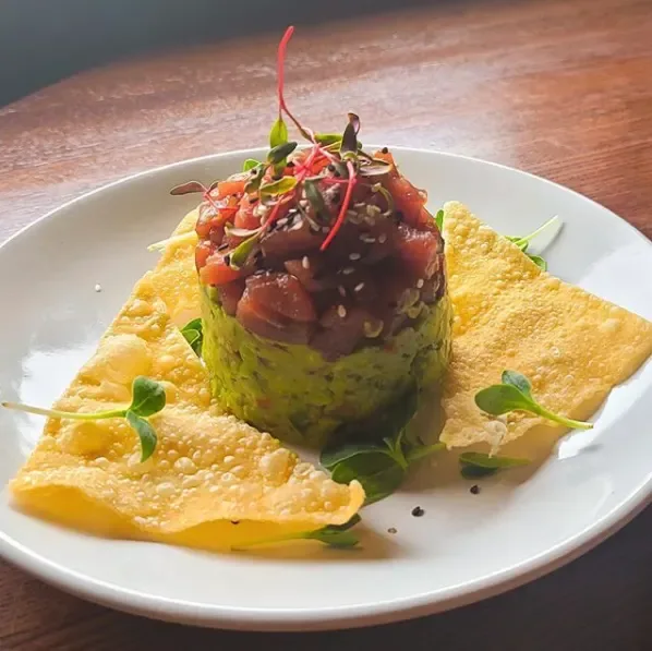 Seafood-topped guacamole with chips at Youell's Oyster House
