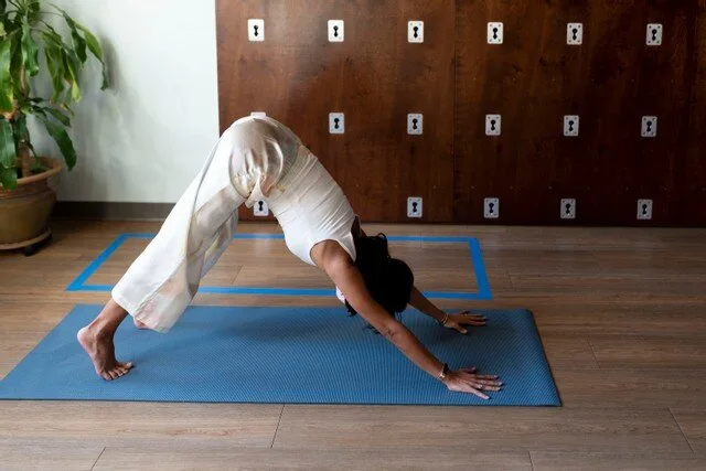Yoga practice with the participant’s face out of view