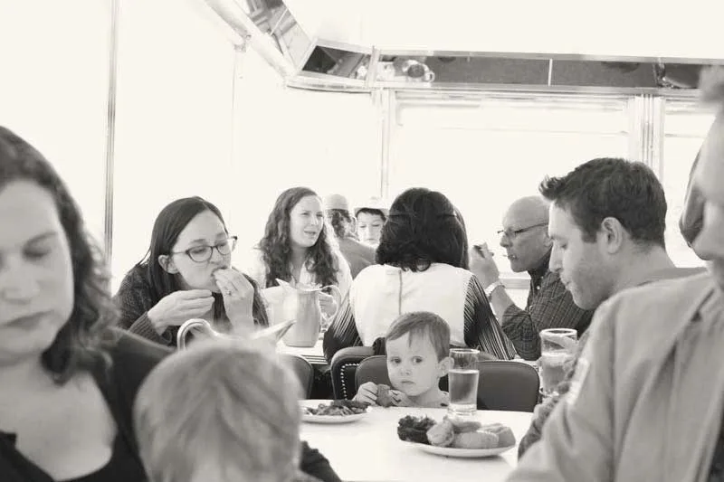 Guests eating together at Larder